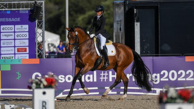 Germany’s Michele George scores 82.86% in the grade V freestyle to claim the gold medal at the World Para Dressage Championships