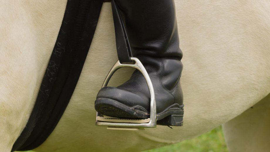 Rider’s foot in stirrup